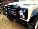 1985  Defender 110 LHD Ivory day 13 SVX grill and HD bumper close.jpg
