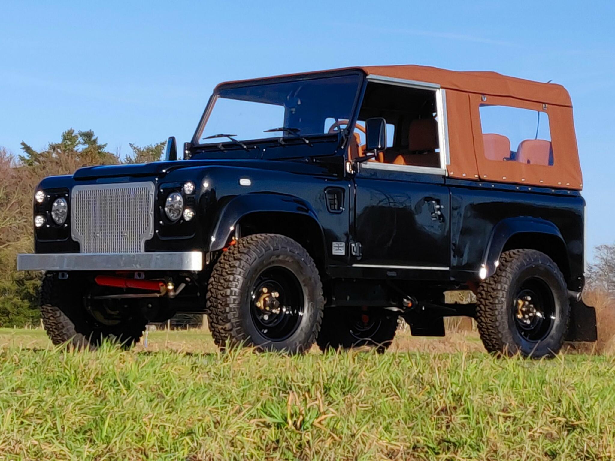 1991 LR LHD Defender 90 Tdi Black B Chestnut Top left front.jpg