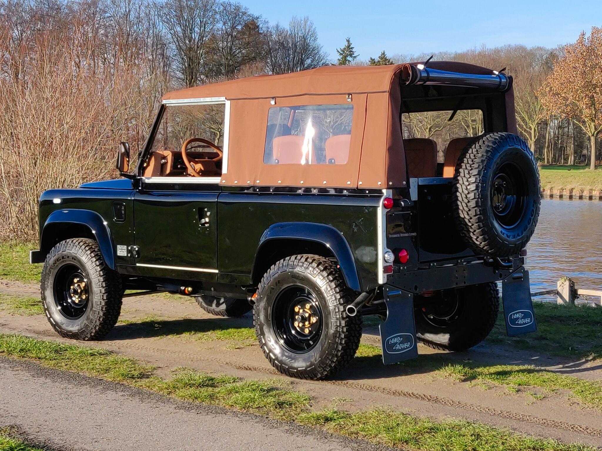 1991 LR LHD Defender 90 Tdi Black B Chestnut Top left rear.jpg